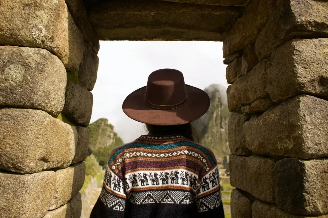 Panoramic view of Machu Picchu ruins with Huayna Picchu peak